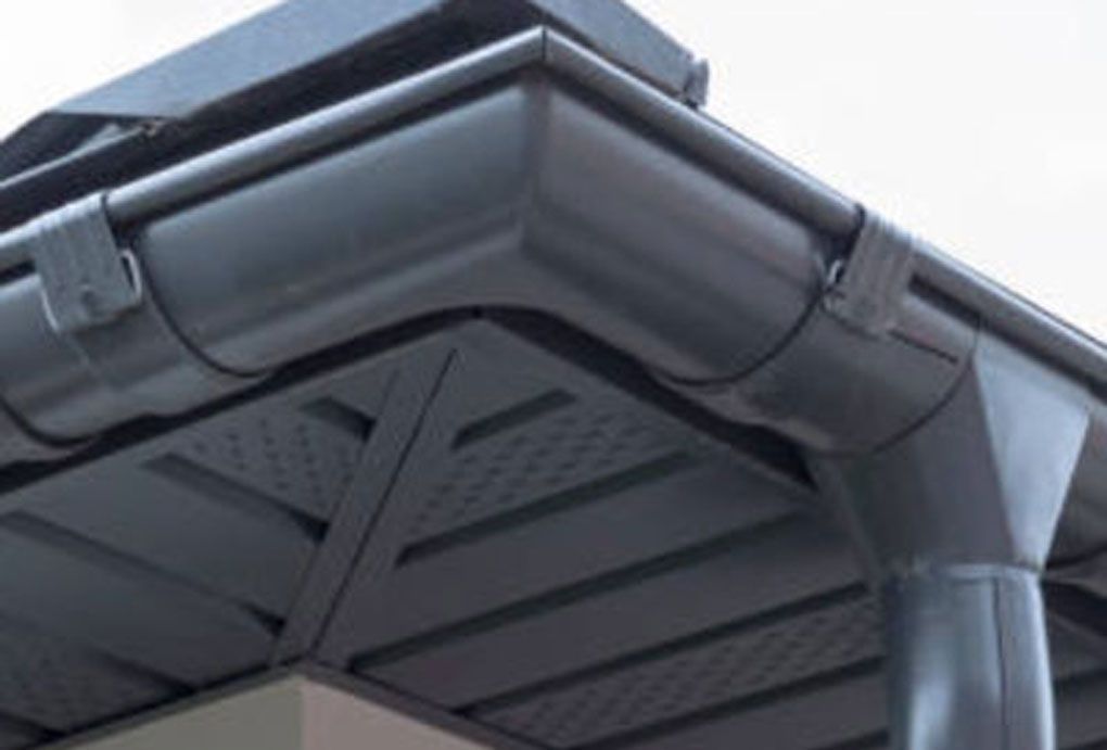 Painted downspouts and eaves troughs
