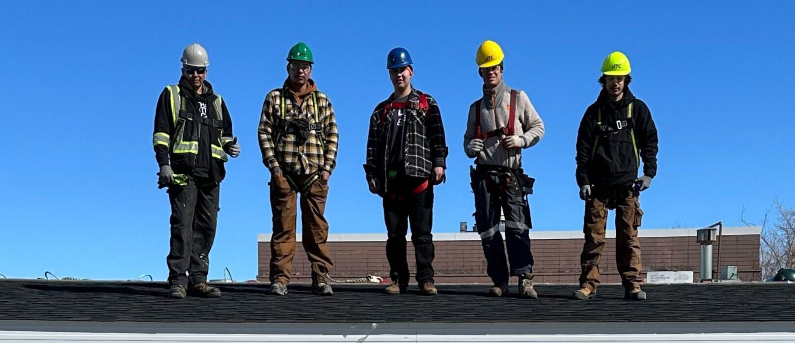 Indigenous Training Center Crew smiling on a rooftop