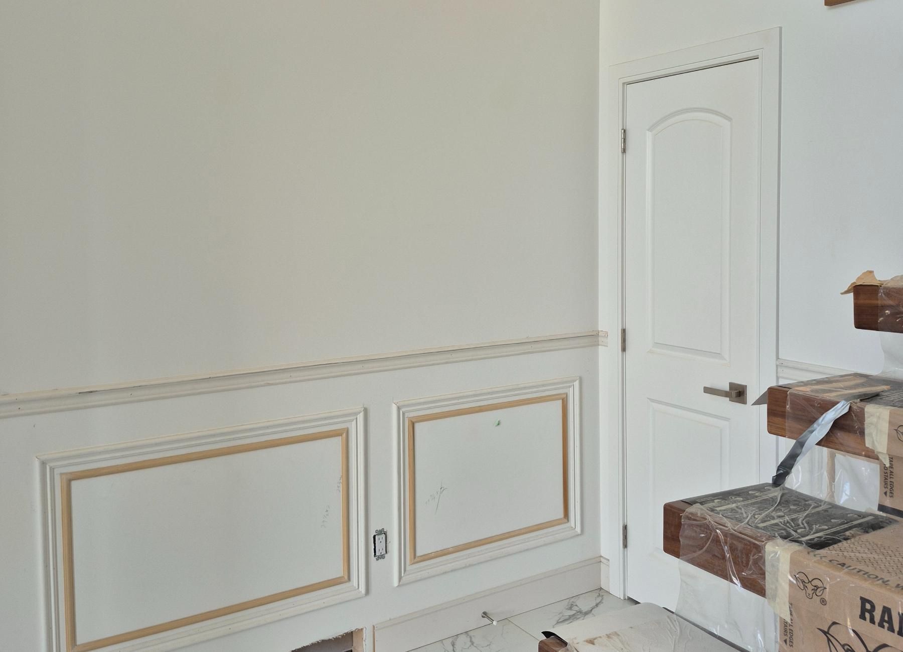 stairway repaint in progress Saskatoon house