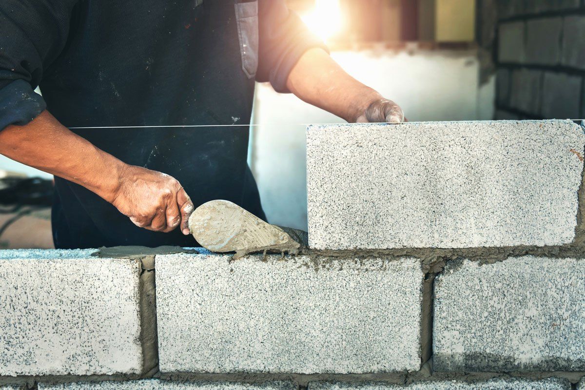 Man Building Wall Bricks — Apollo, PA — T. D. Brick Pointing, LLC