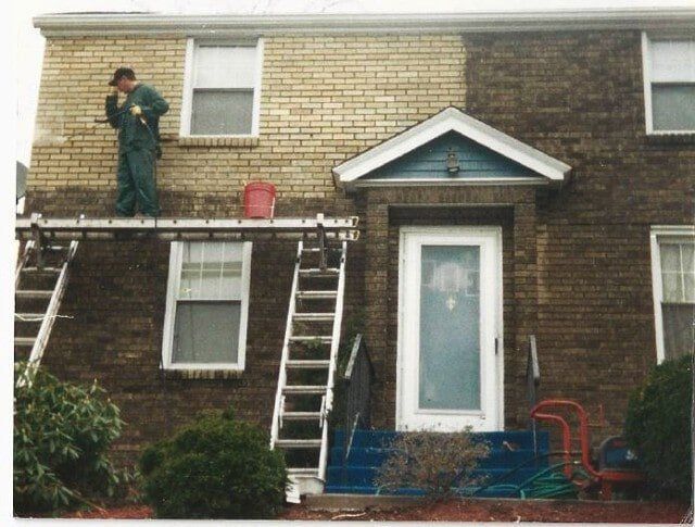 Worker Fixing House — Apollo, PA — T. D. Brick Pointing, LLC