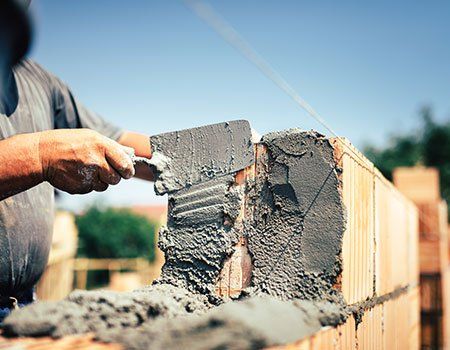 Construction Worker Installing Bricks — Apollo, PA — T. D. Brick Pointing, LLC