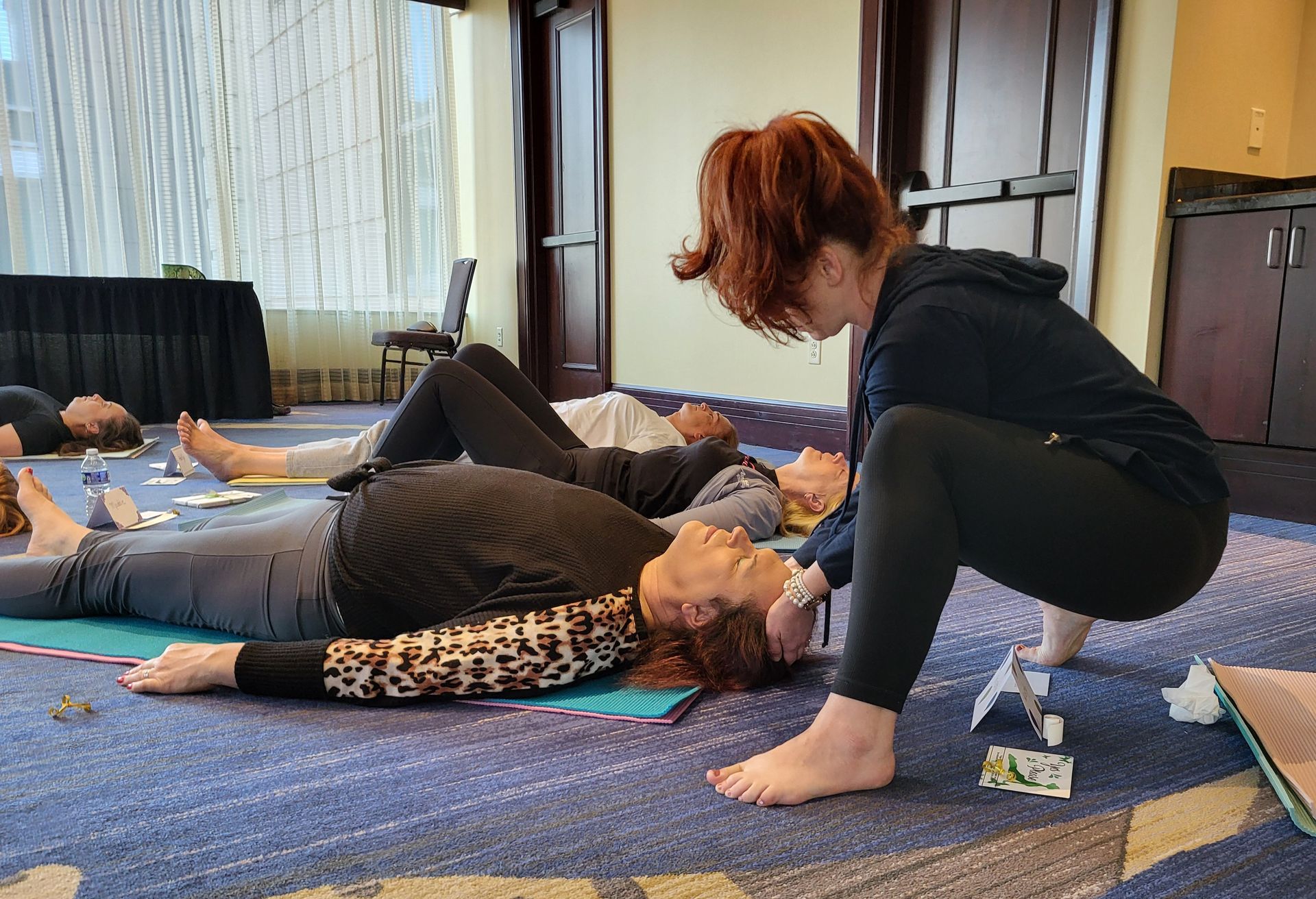 women sitting after yoga class