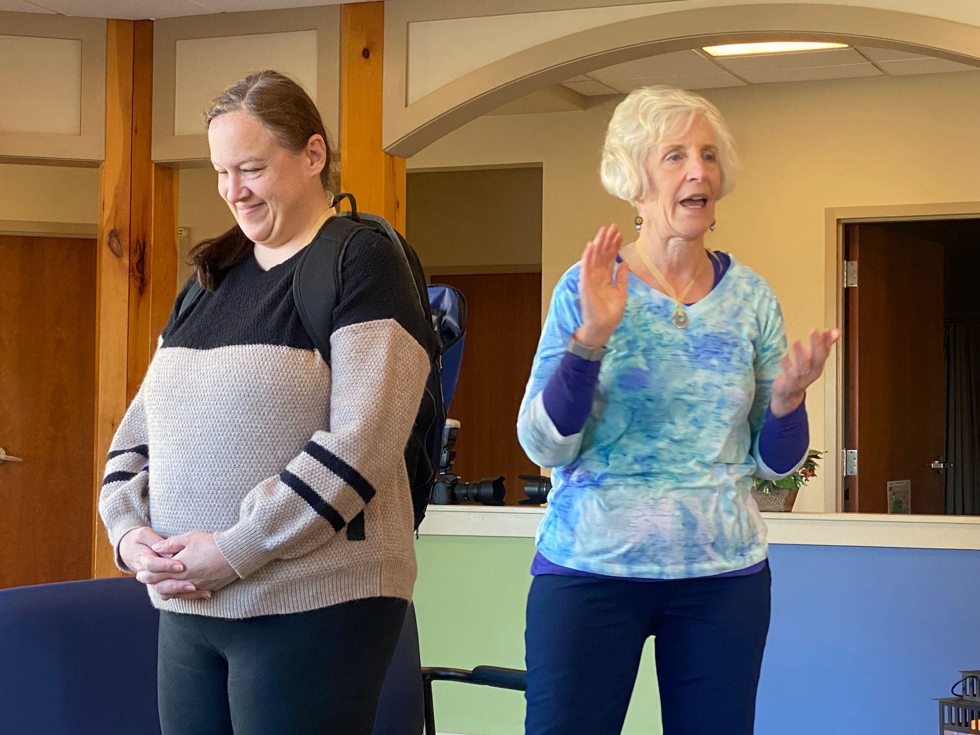 woman meditating in the woods