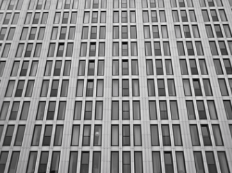 black and white commercial building with many windows
