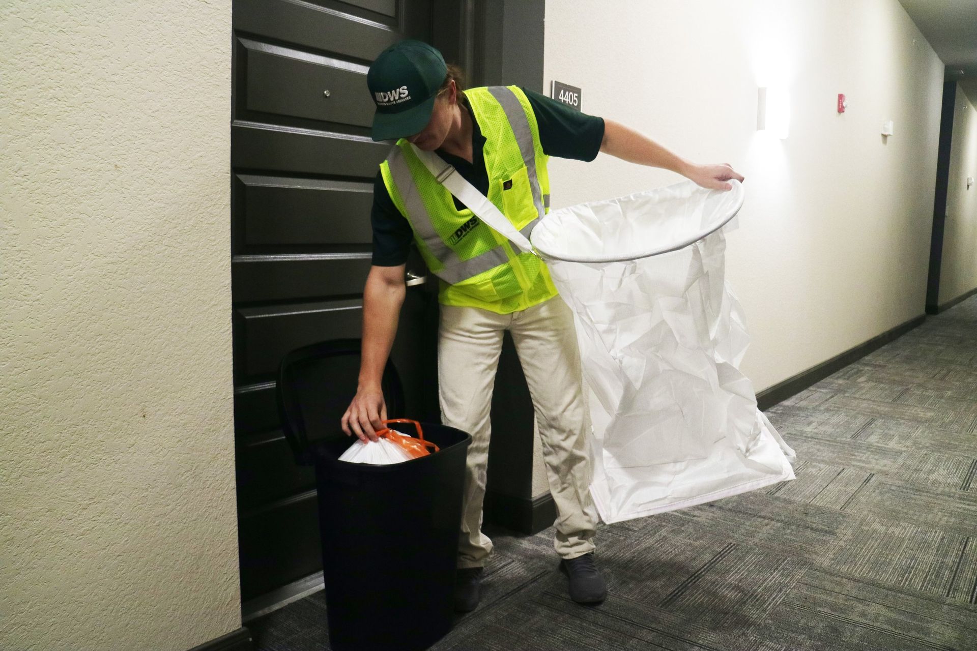 Walker Trash Solutions team providing doorstep trash pickup