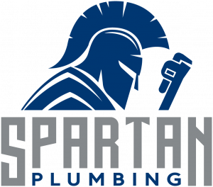 A spartan plumbing logo with a helmet and a wrench