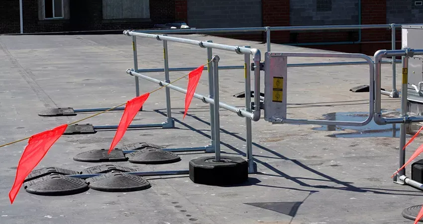 A roof with a safety line attached to it. A roof with a safety line attached to it.