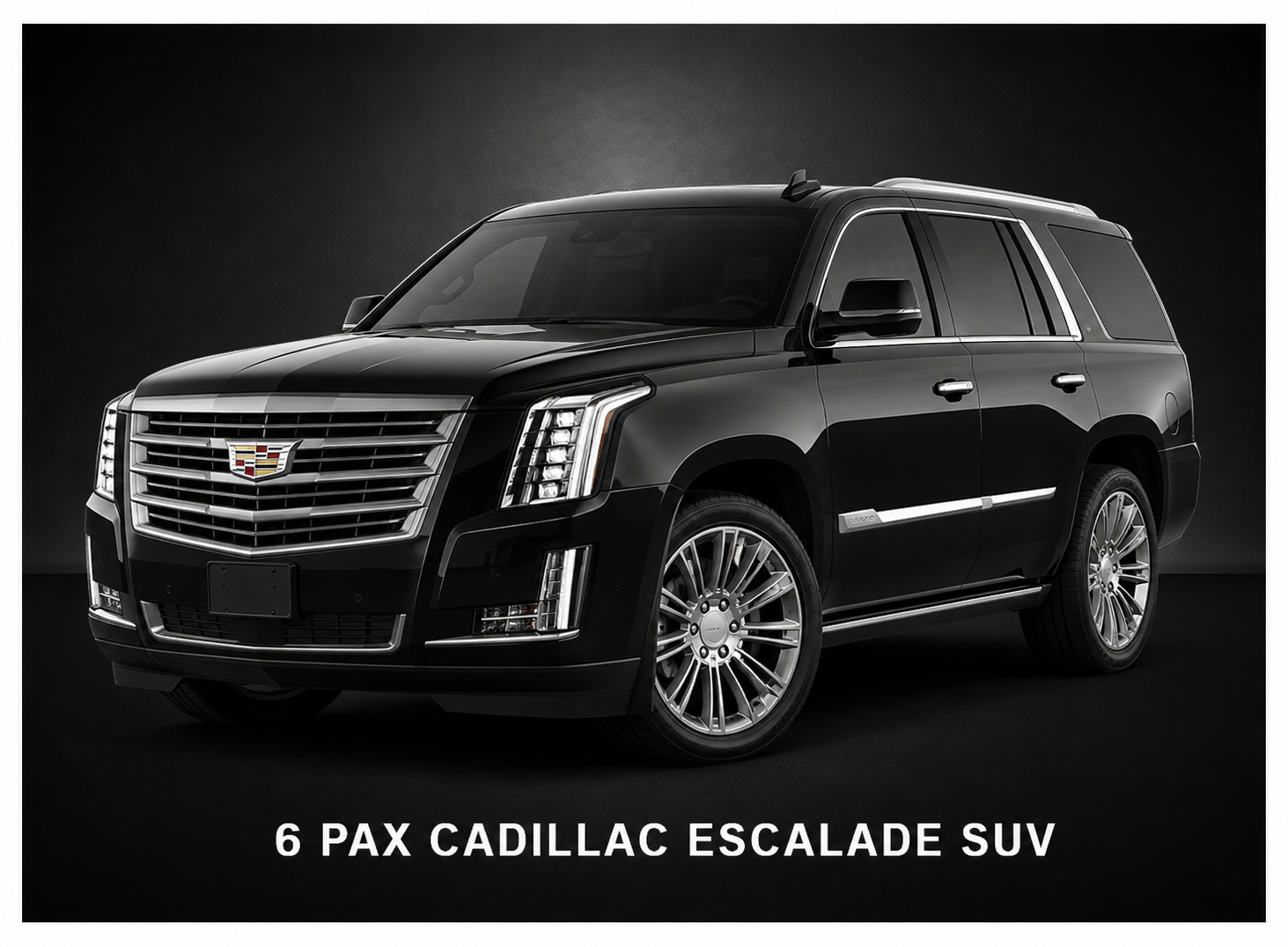 A black cadillac xt6 is parked on a black background.