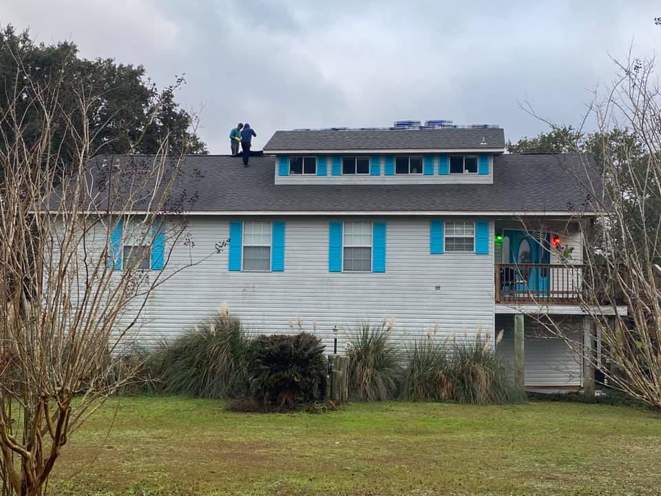 Jones Roofing performing roof inspection looking for damage