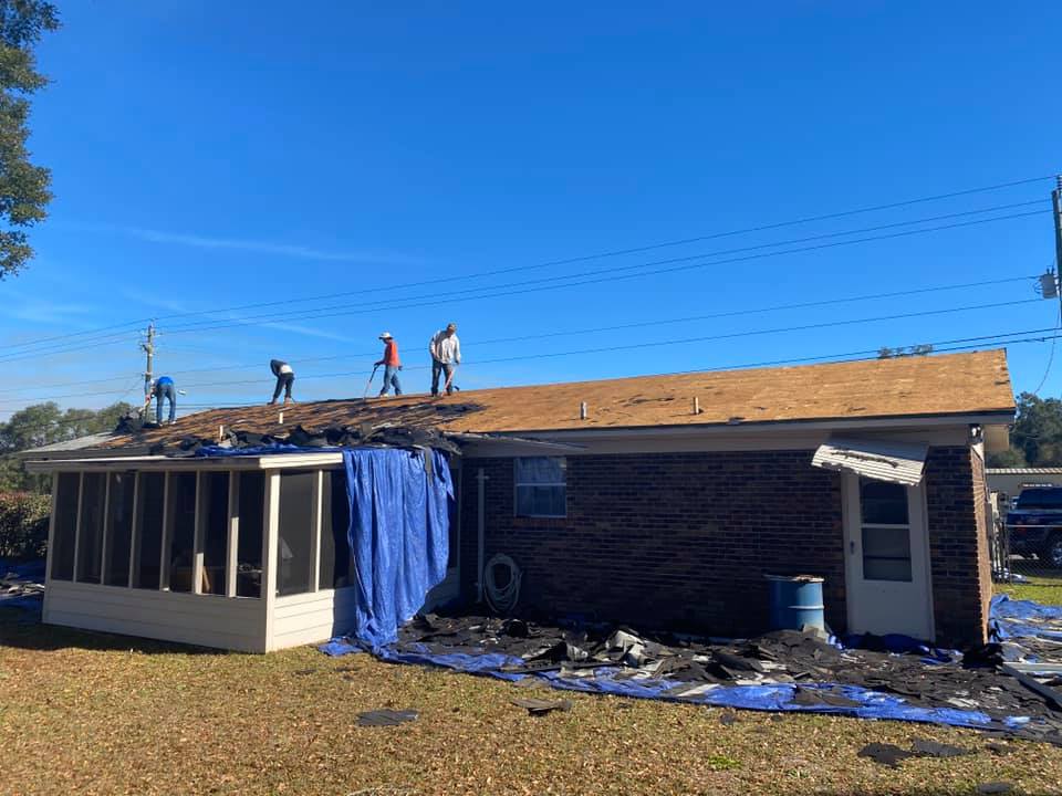 Roof repair work in progress by Jones Roofing team