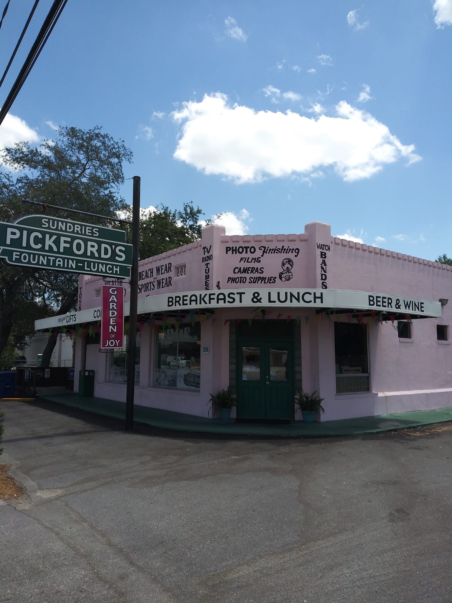 A pink building with a sign that says pickford 's