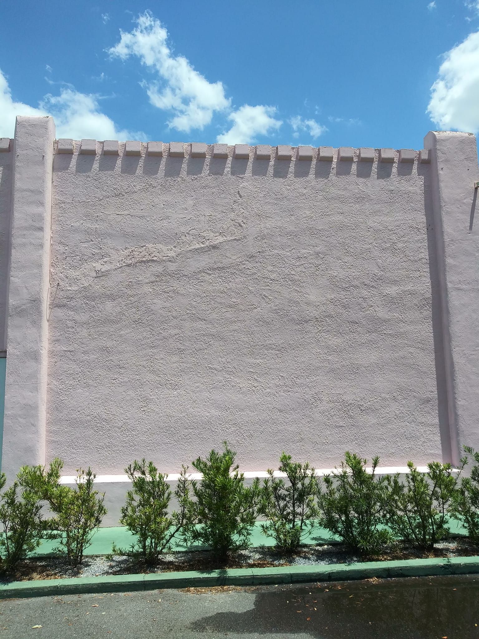Stucco wall pressure washing