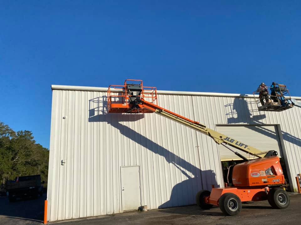 Gutter installation on commercial building wesley chapel roofers