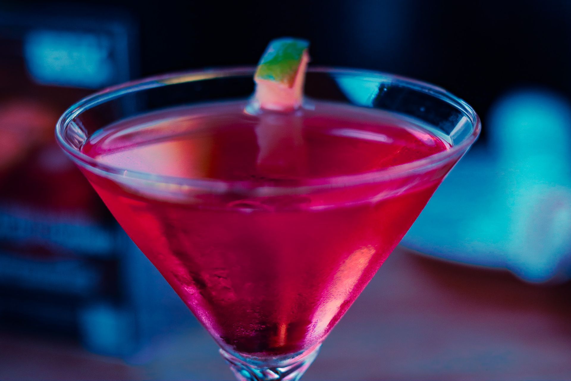 Close-up shot of a cosmopolitan cocktail in Salem Oregon, highlighting vibrant color, glassware detail, and a refined cocktail aesthetic.