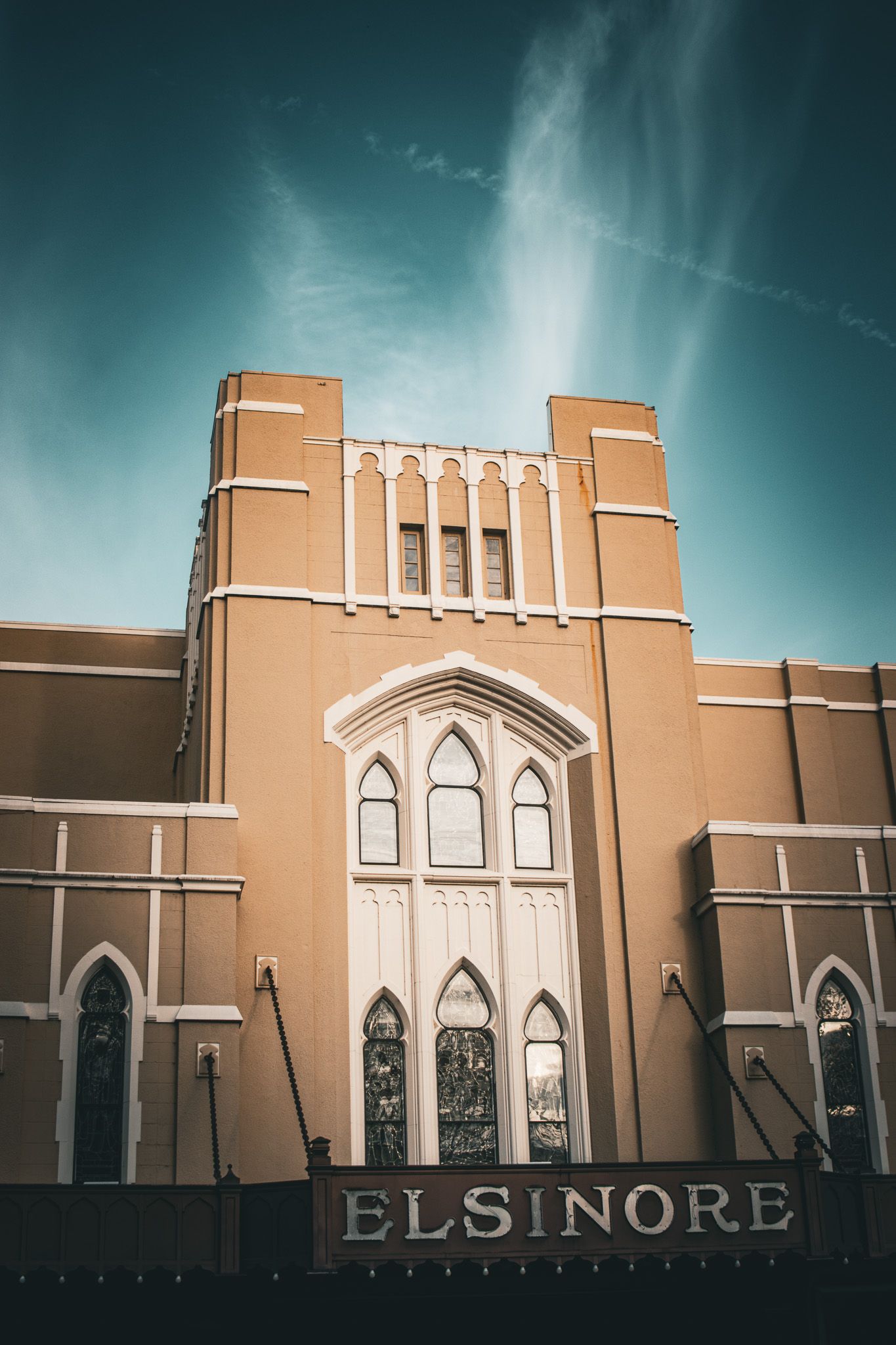 Luxury exterior view of the Elsinore Theatre in Salem Oregon, highlighting historic architecture, elegant lighting, and refined downtown presence.