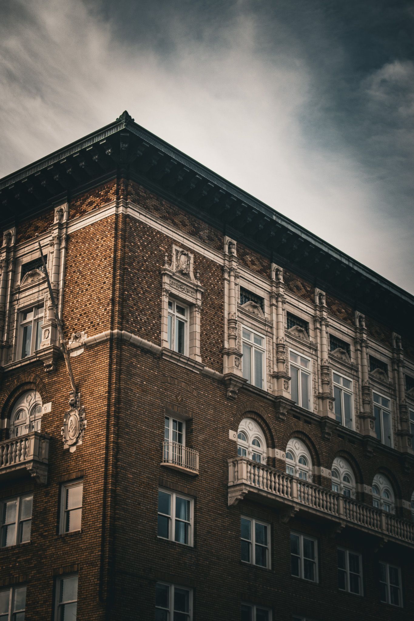Historic Masonic Temple and Franklin Building in downtown Salem Oregon, featuring carved Masonic symbols and lion head architectural details at State and High Streets.