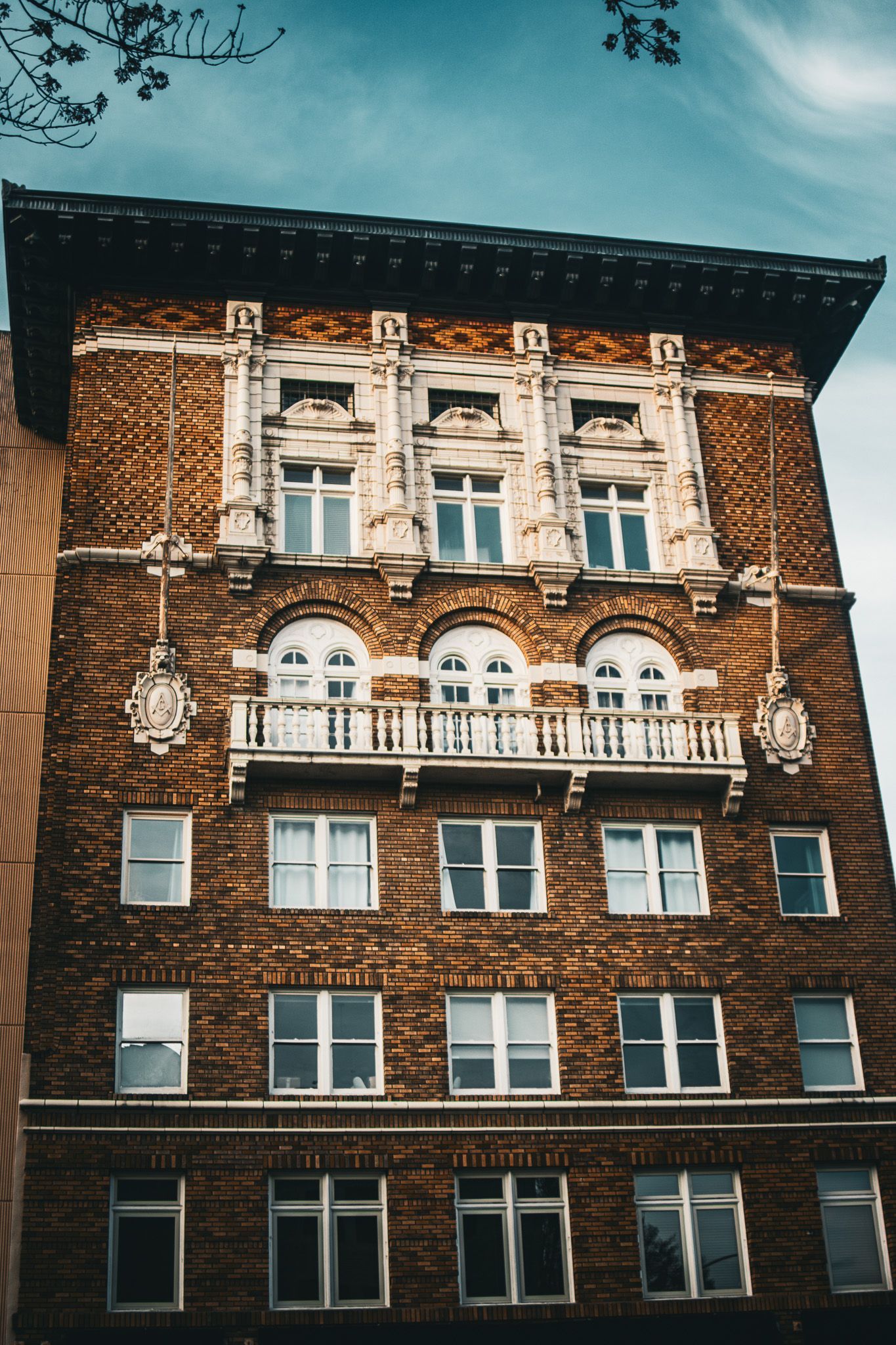 Historic Masonic Temple and Franklin Building in downtown Salem Oregon, featuring carved Masonic symbols and lion head architectural details at State and High Streets.