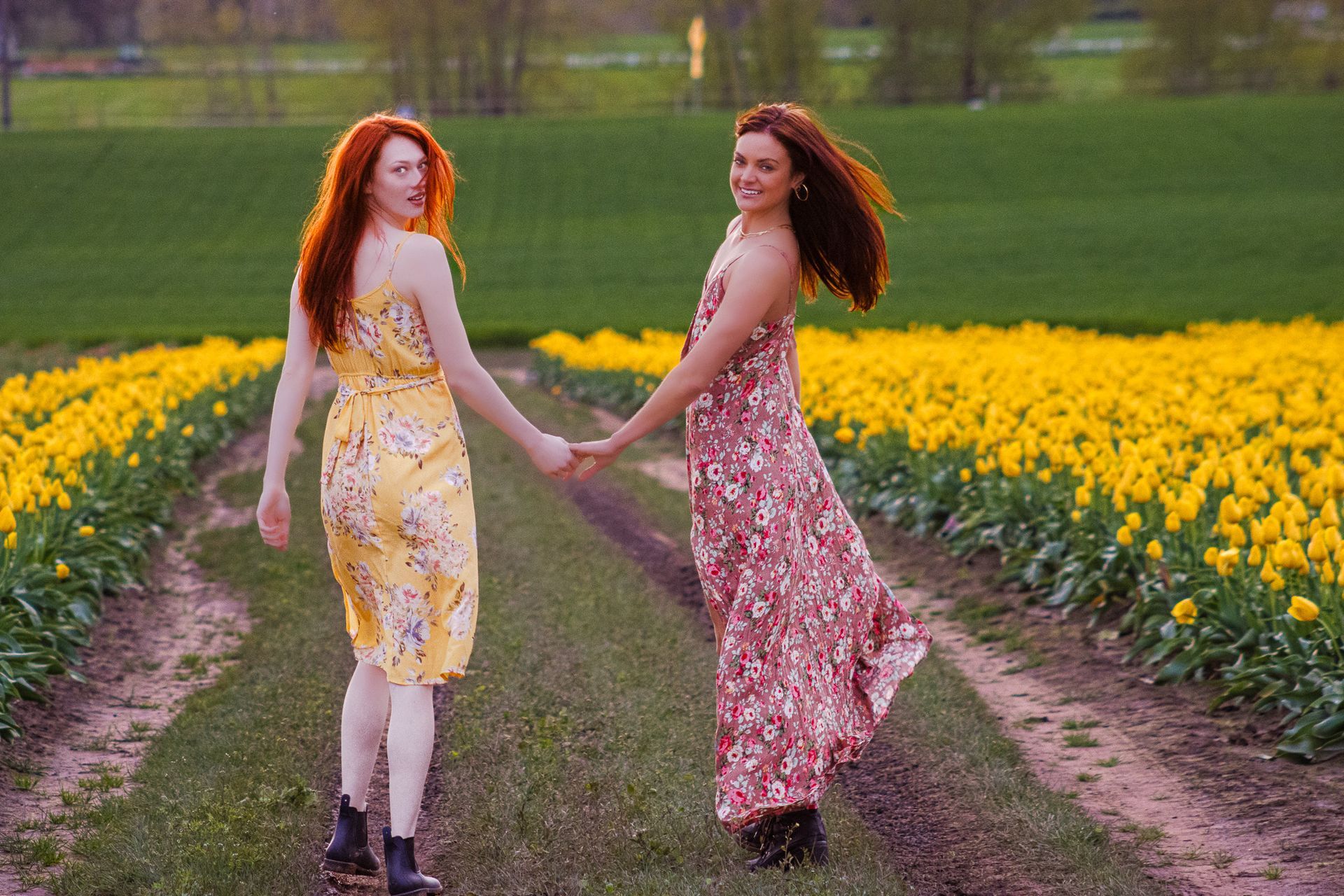 Models Shelby and Kiera in a spring editorial photoshoot at the Wooden Shoe Tulip Farm in Oregon, featuring luxury cinematic portrait photography by Verity Visions.