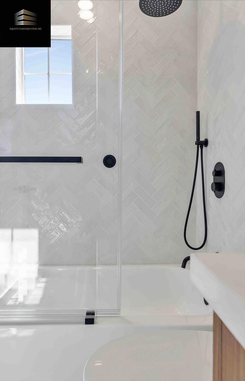 White and black bathroom with a shower and tub, black shower fixtures, and a window.