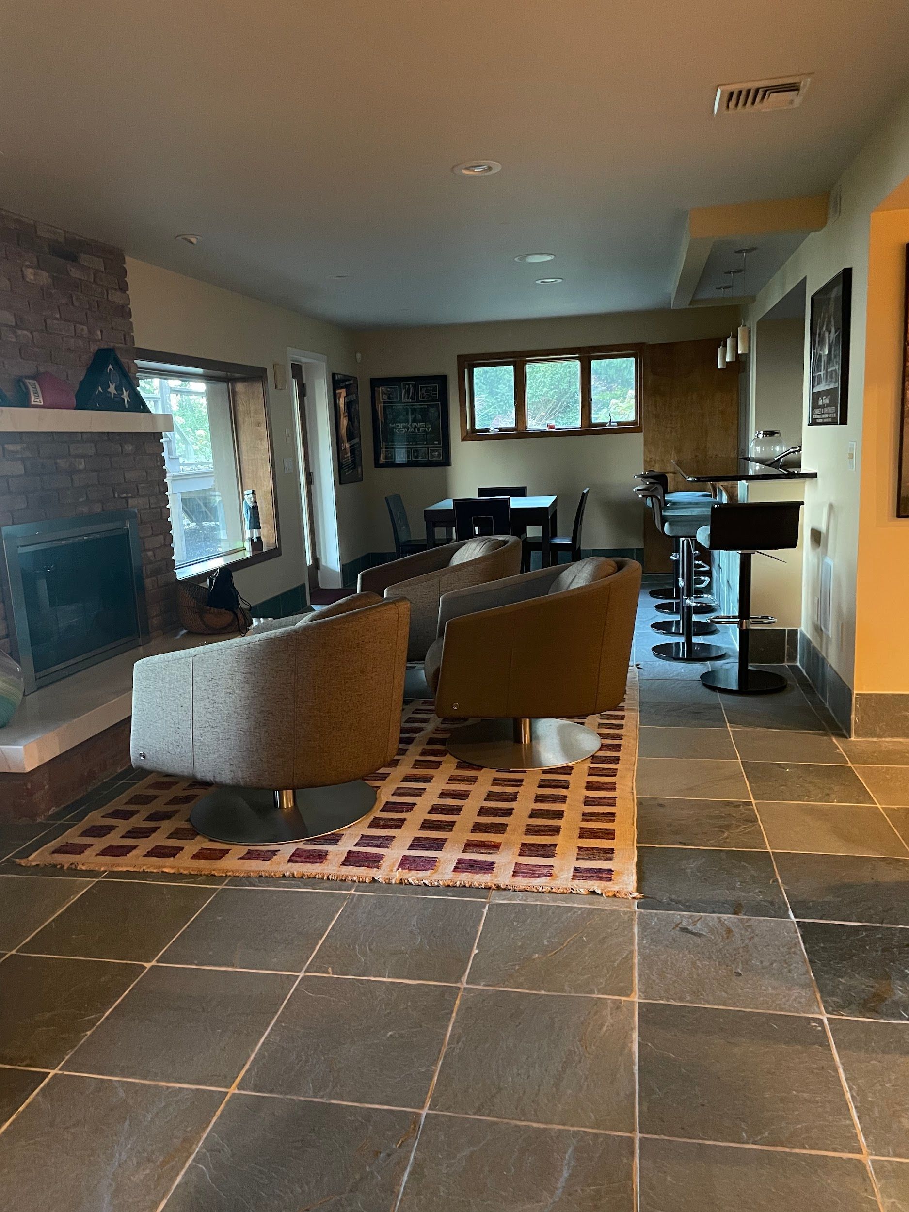 A living room filled with furniture and a fireplace