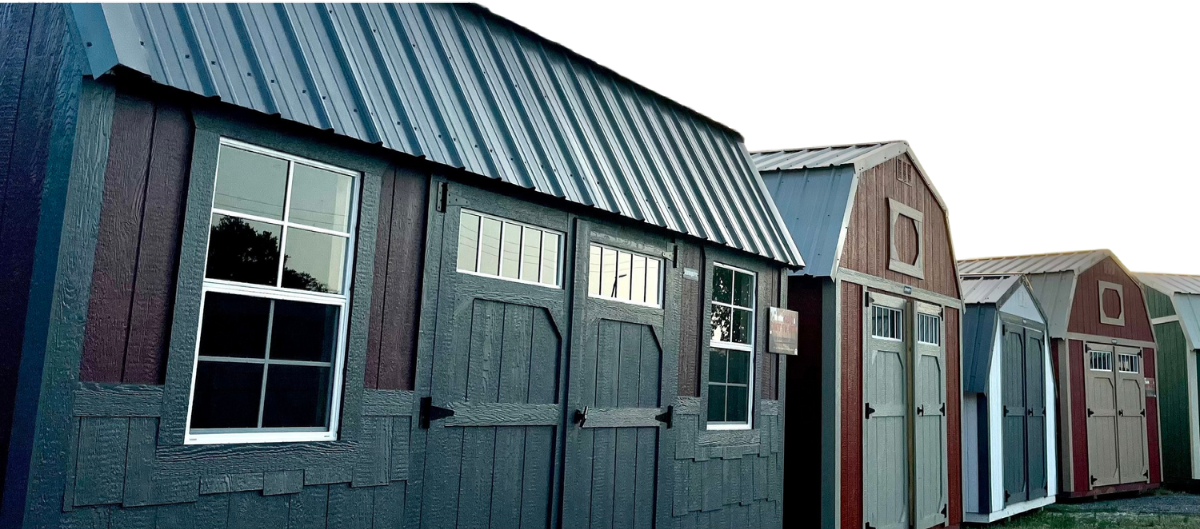 A row of sheds are lined up in a row.