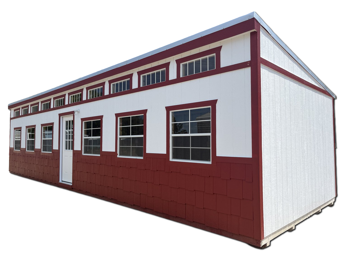 A red and white building with lots of windows
