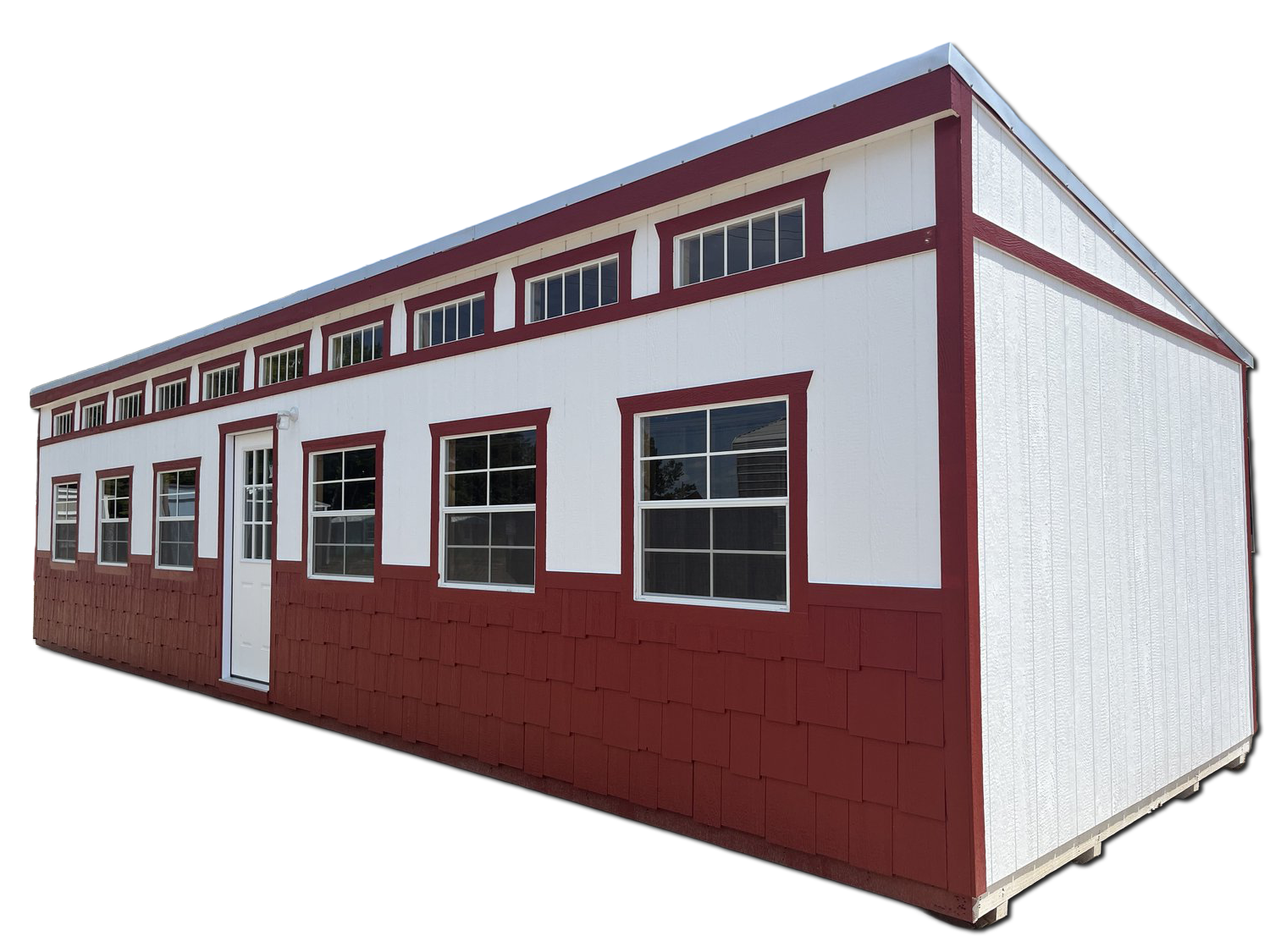 A red and white building with lots of windows