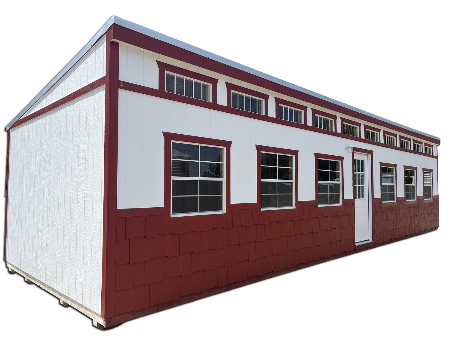 A red and white building with a lot of windows