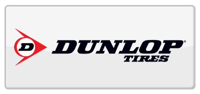 Dunlop Tires logo with a stylized red arrow and the letter D on a white rectangular background.