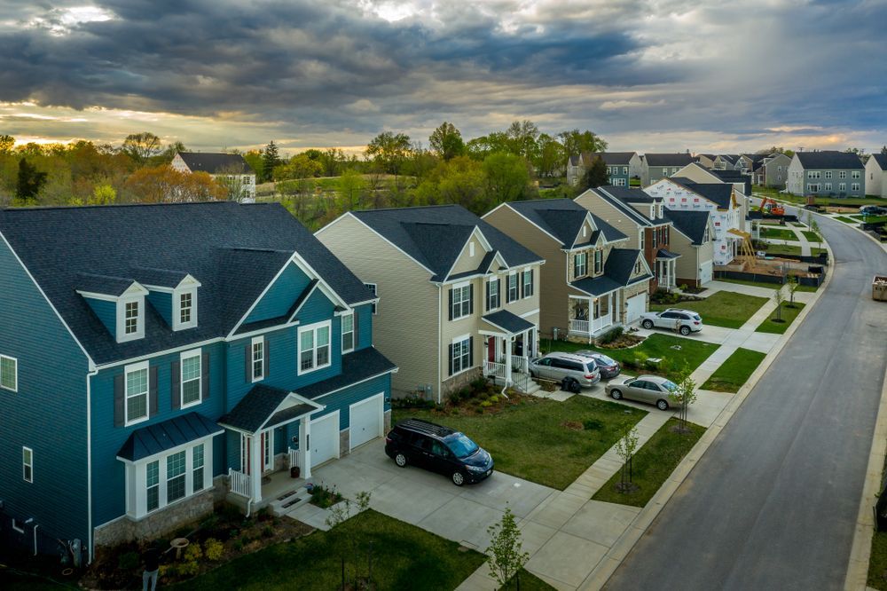 An aerial view of a row of houses in a residential neighborhood.