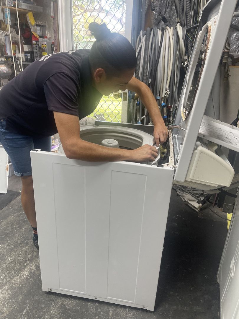 Technician Checking Washing Machine — Appliance Repair in The Entrance, NSW