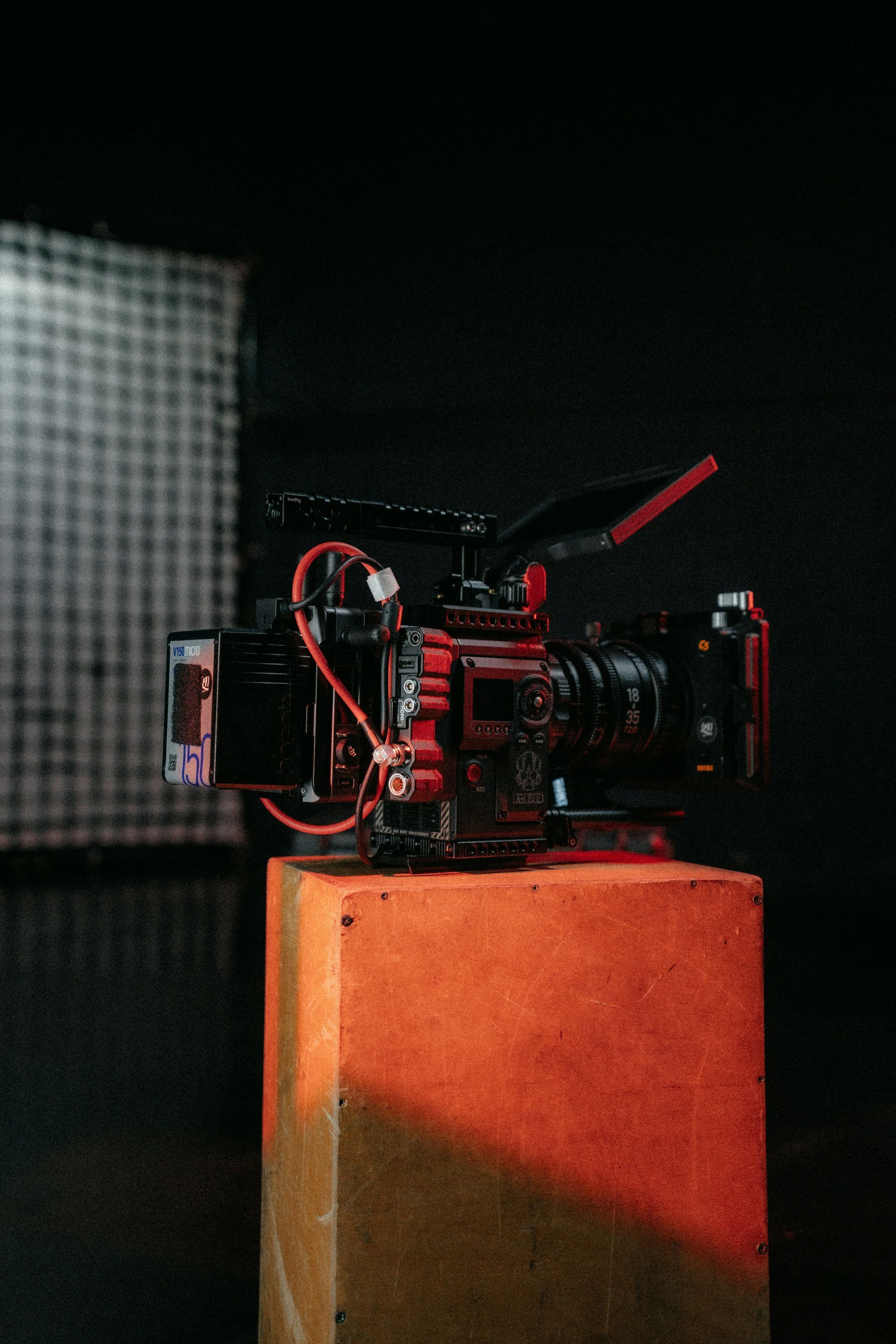 Cinema digital film camera sitting on an apple box