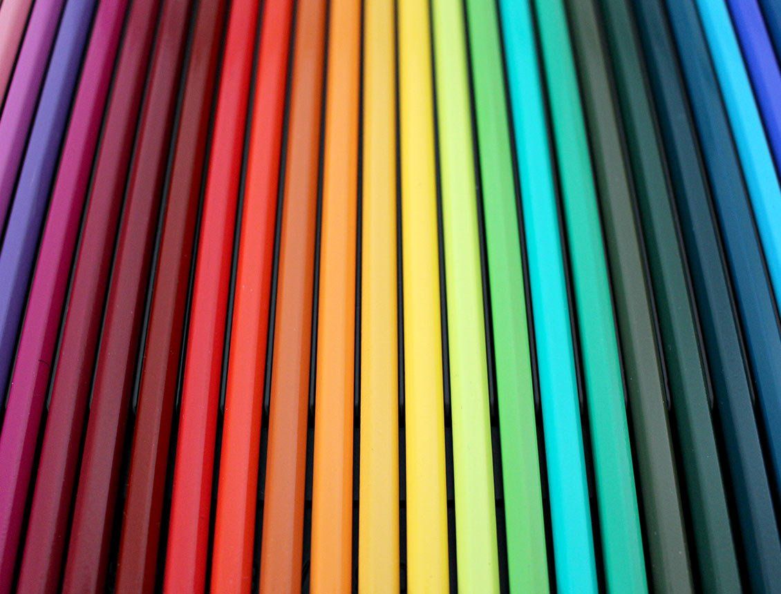 Perfectly lined up colored pencils