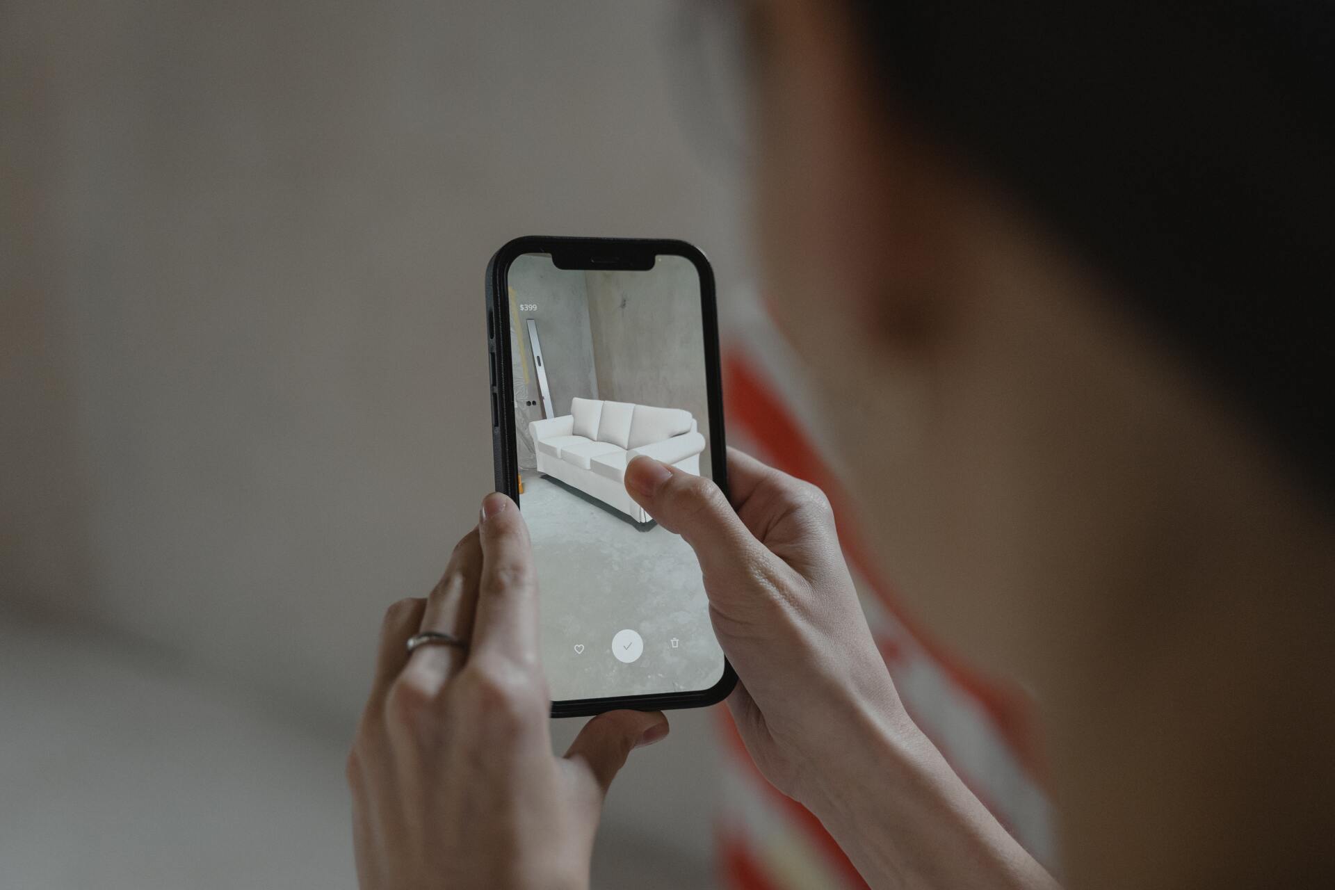 Close up of person using a phone with AR