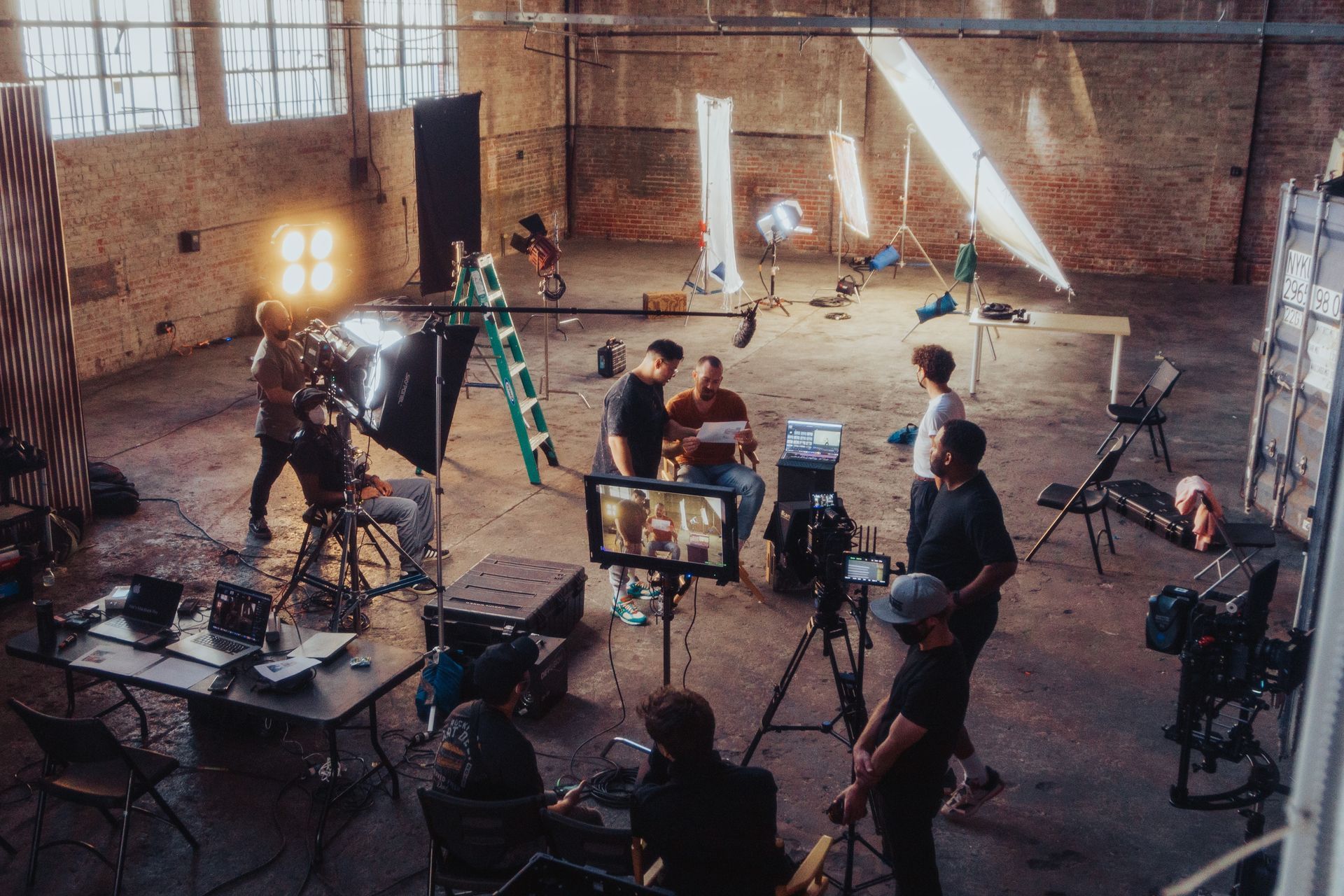 Behind the scenes film shoot in a warehouse