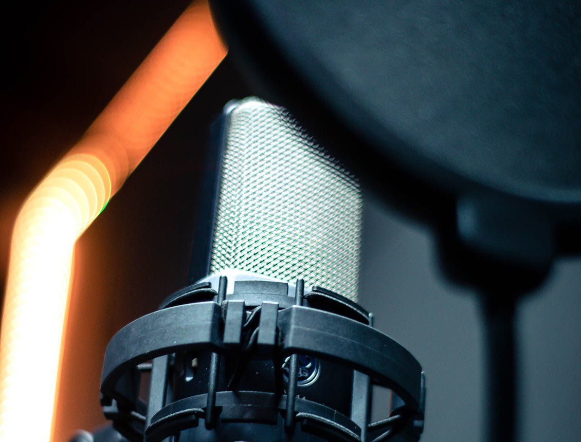 Close up image of a professional voice over studio microphone for video production projects