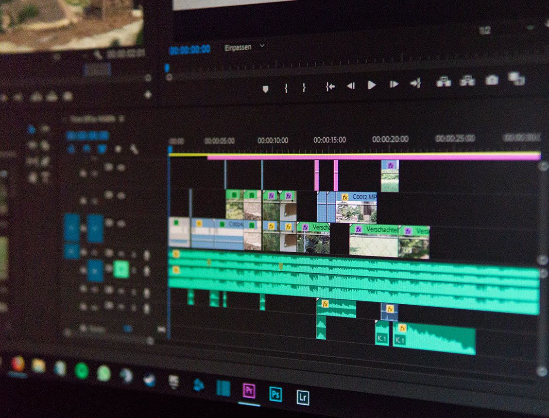 Close up monitor showing an Adobe Premiere timeline