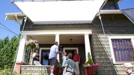 Wave TV spot behind the scenes exterior location shoot on porch with lighting diffusion