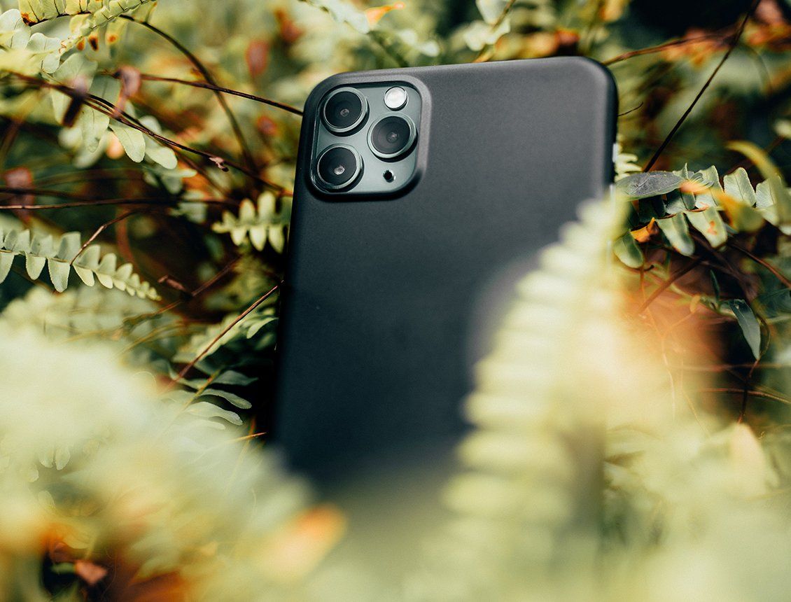Close up of iPhone in forest