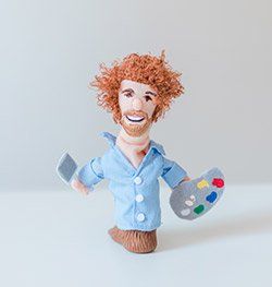 Bob Ross hand puppet image for Spin Creative team page