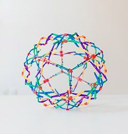 Expanding sphere colorful toy for Spin Creative team page