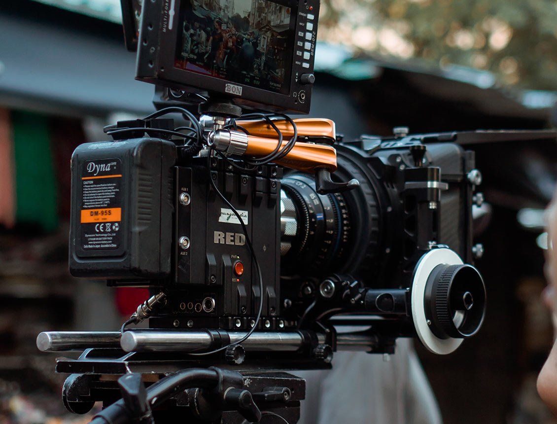 Close up of a RED cinema camera and follow focus rig