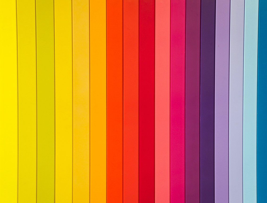 Colorful creative image showing a rainbow of stripes used to convey a creative development process for a video production company and creative agency