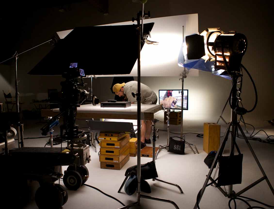 Behind the scenes of video production table top studio shoot.