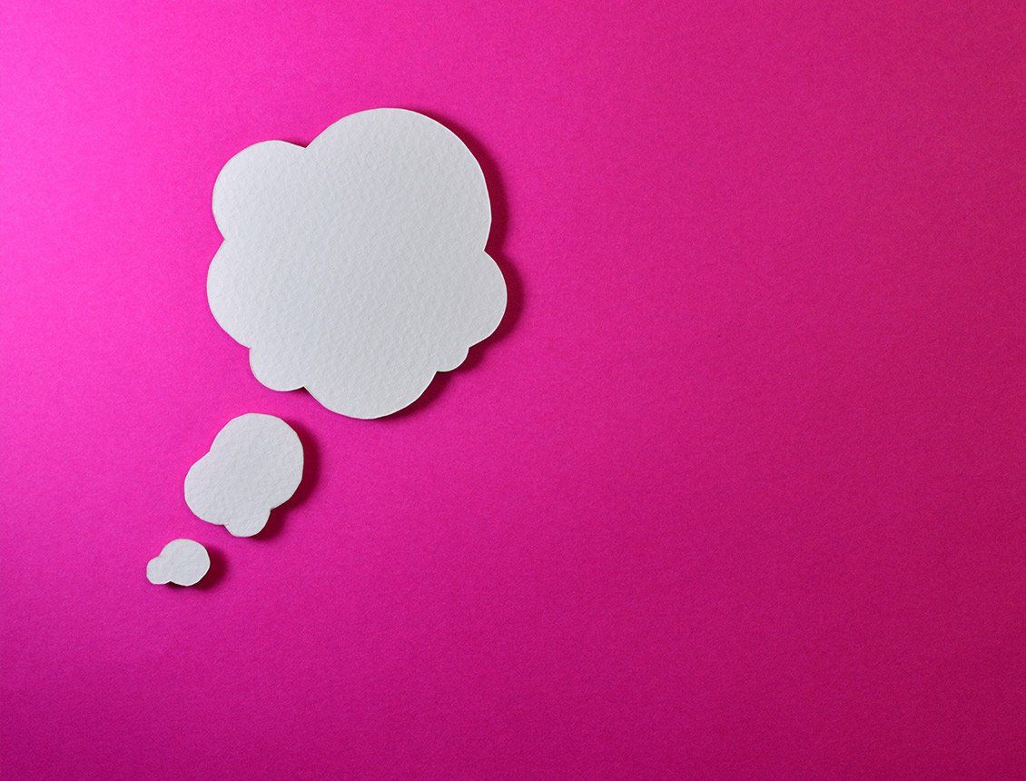 Image of a thought bubble over pink background