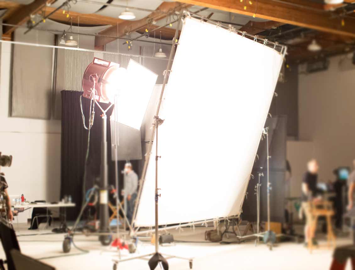 Sound stage studio showing lighting equipment, behind the scenes photo of a video production company shoot in Seattle