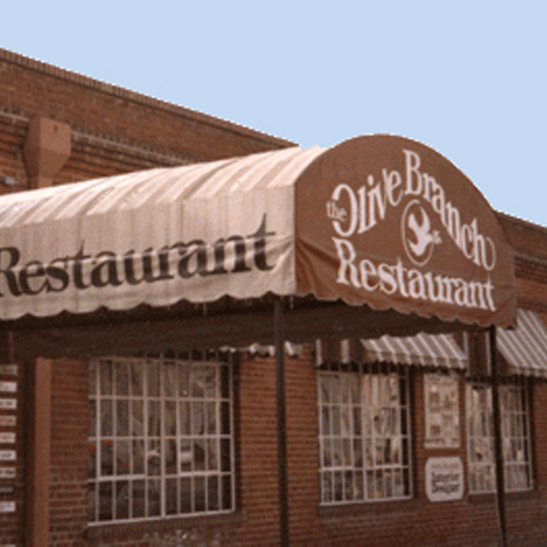 Hand lettered barnwood sign