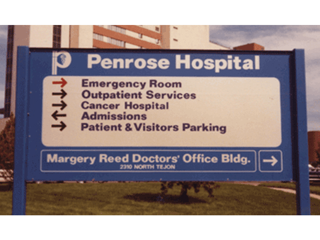 Reflective directional sign with metal posts