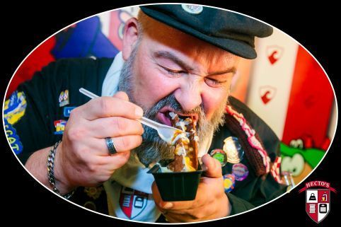 Een logo voor hecto's heeft een schild met een gewicht van 100kg erop